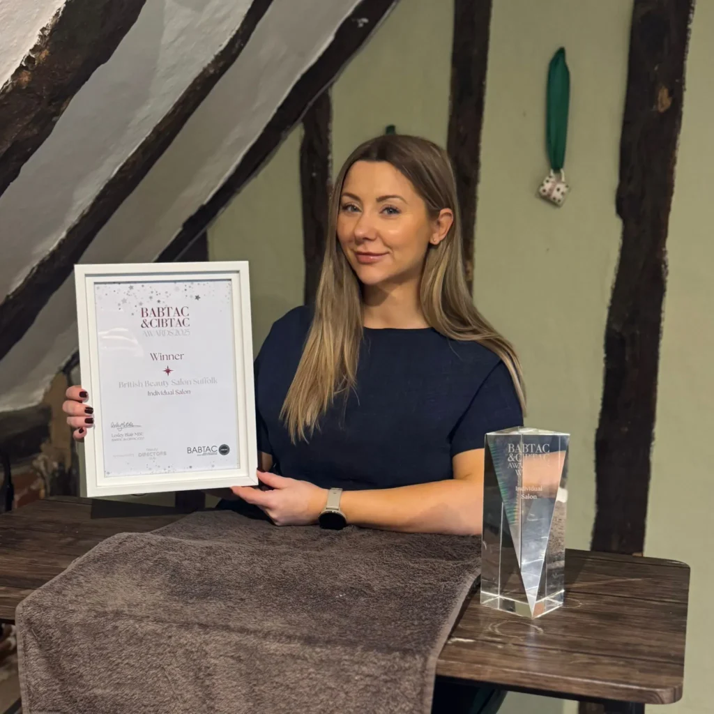 Emily Shelley the owner of British Beauty with her Babtac & Cibtac Award & Trophy